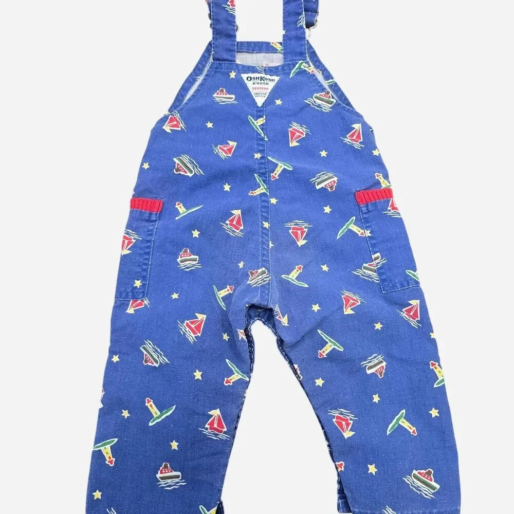 OshKosh B'gosh blue denim overalls with white & red sailboat and star print